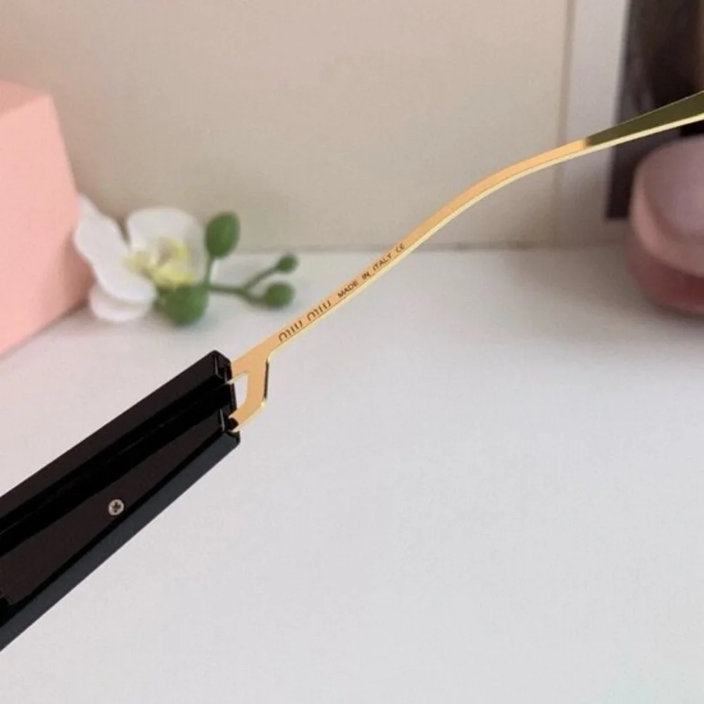 Miu Miu Gold Frame Black Lens Geometric Sunglasses